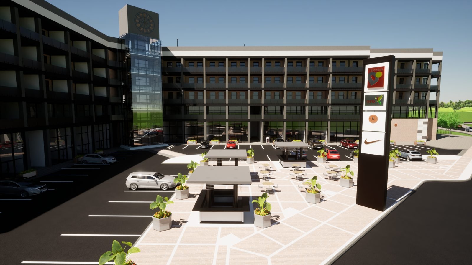 Milán Plaza's central plaza with café area and brand signage